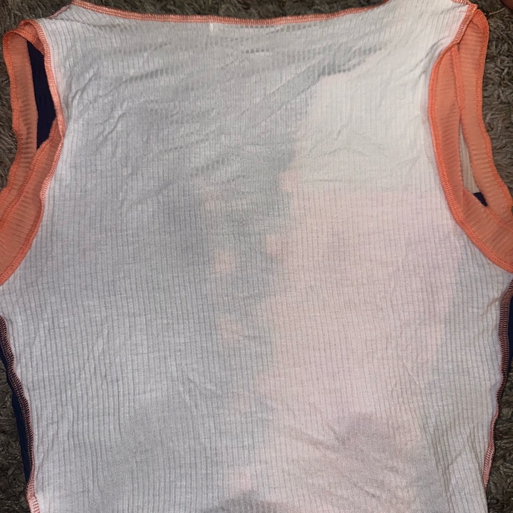 Orange and navy, distressed crop top with laceable front.